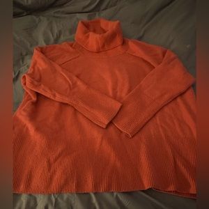 Coral Athleta sweater.